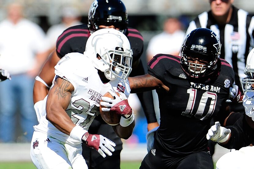 STARKVILLE, MS - NOVEMBER 03:  Sean Porter #10 of the Texas A&M Aggies pursues LaDarius...