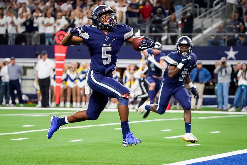 Frisco Lone Star running back Jaden Nixon celebrates as goes into to the end zone on an...
