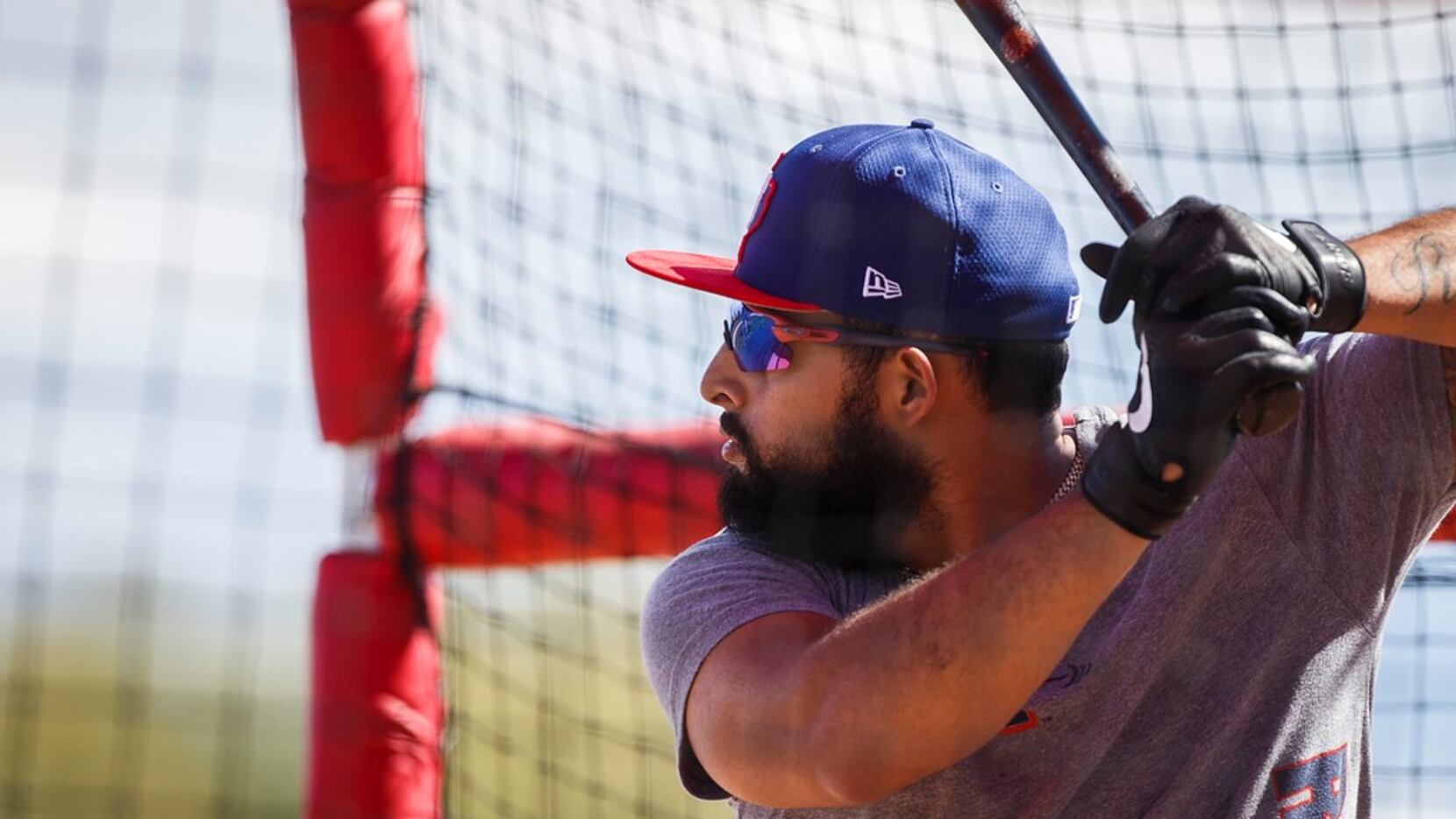 Texas Rangers infielder Rougned Odor takes batting practice during a spring training workout...