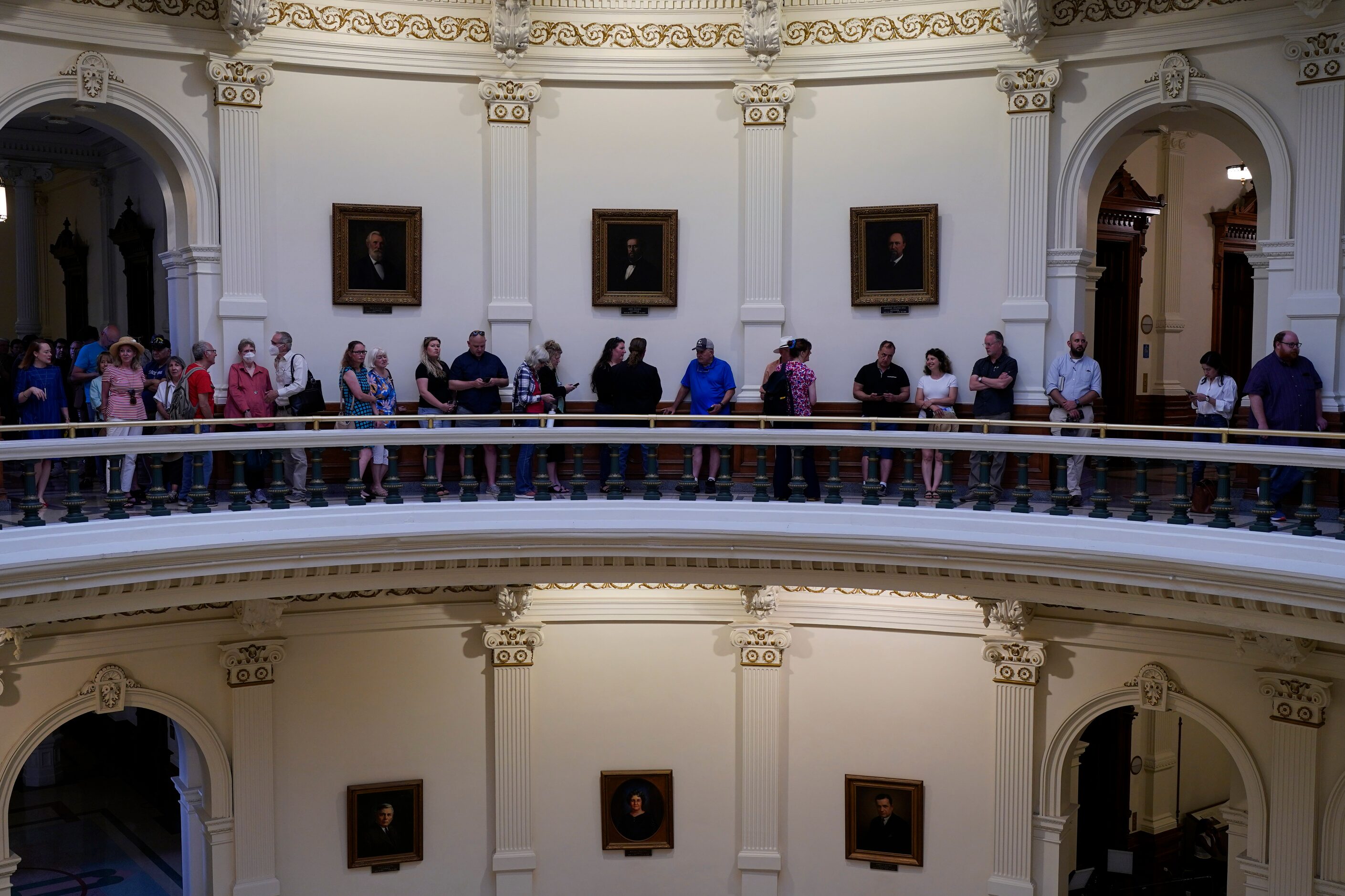 Visitors arrive and line up for the impeachment proceedings against state Attorney General...