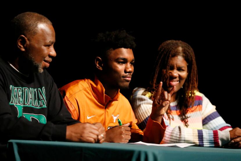 Kobe Boyce of Lake Dallas High School poses for photos with his parents David Boyce and Mary...