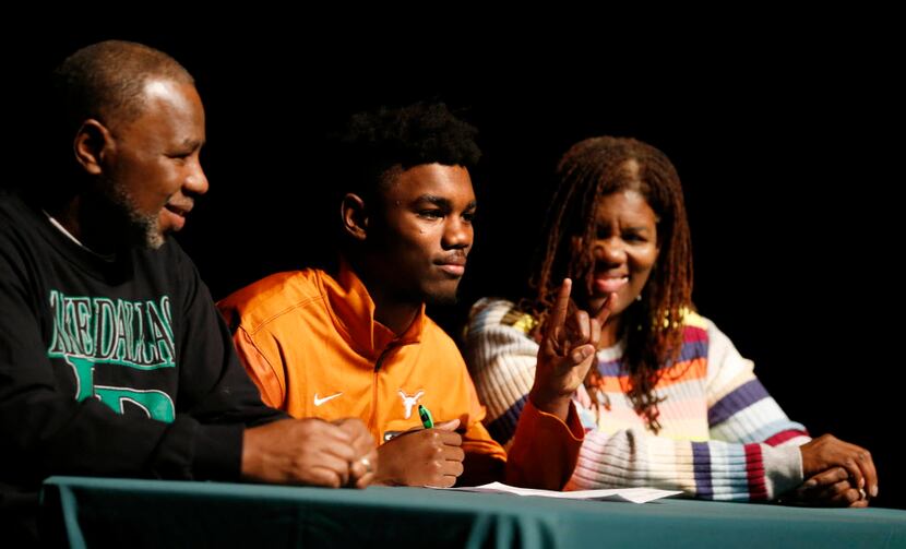 Kobe Boyce of Lake Dallas High School poses for photos with his parents David Boyce and Mary...