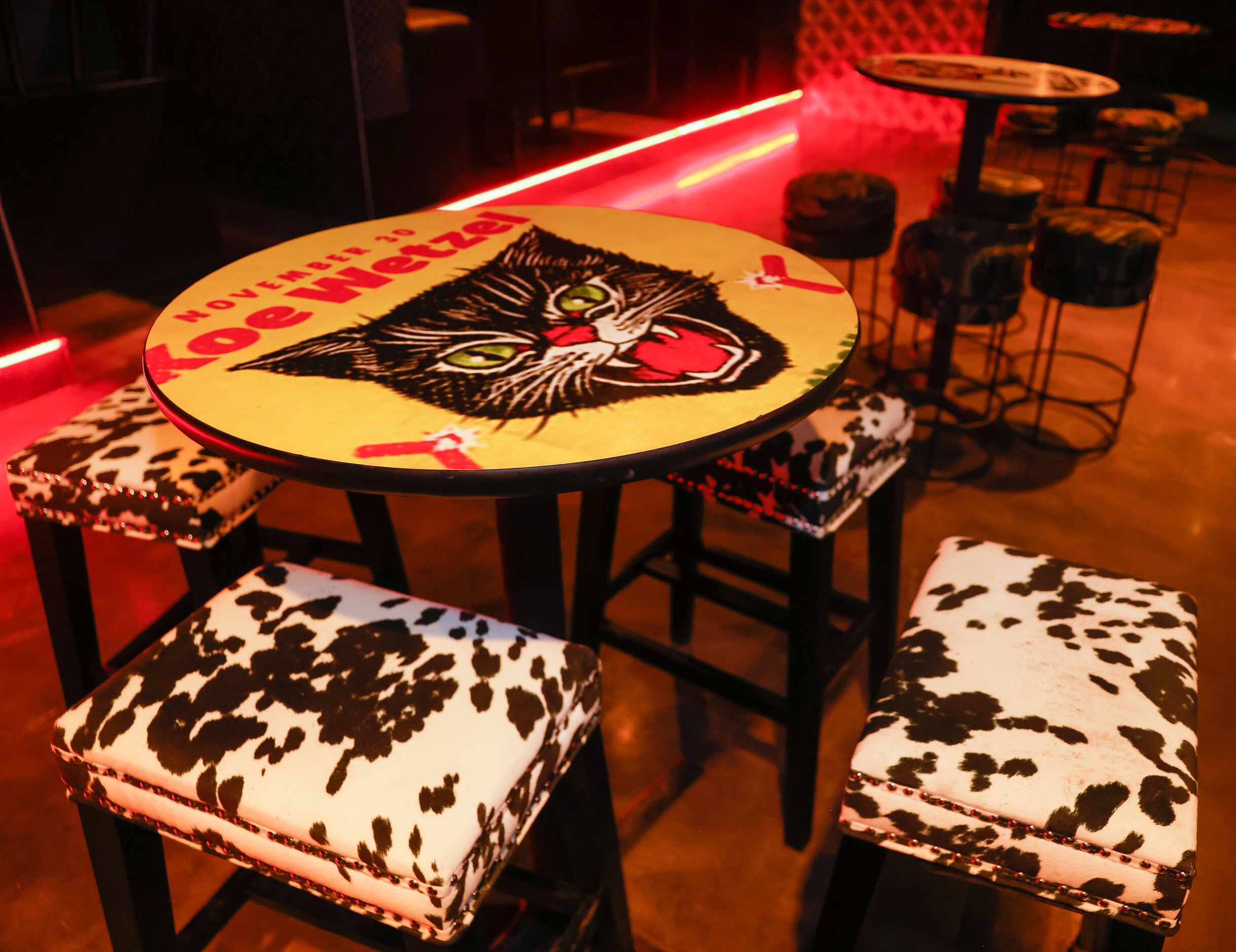 A Koe Wetzel print decorates tables in his namesake Koe Wetzel’s Riot Room in Fort Worth on...