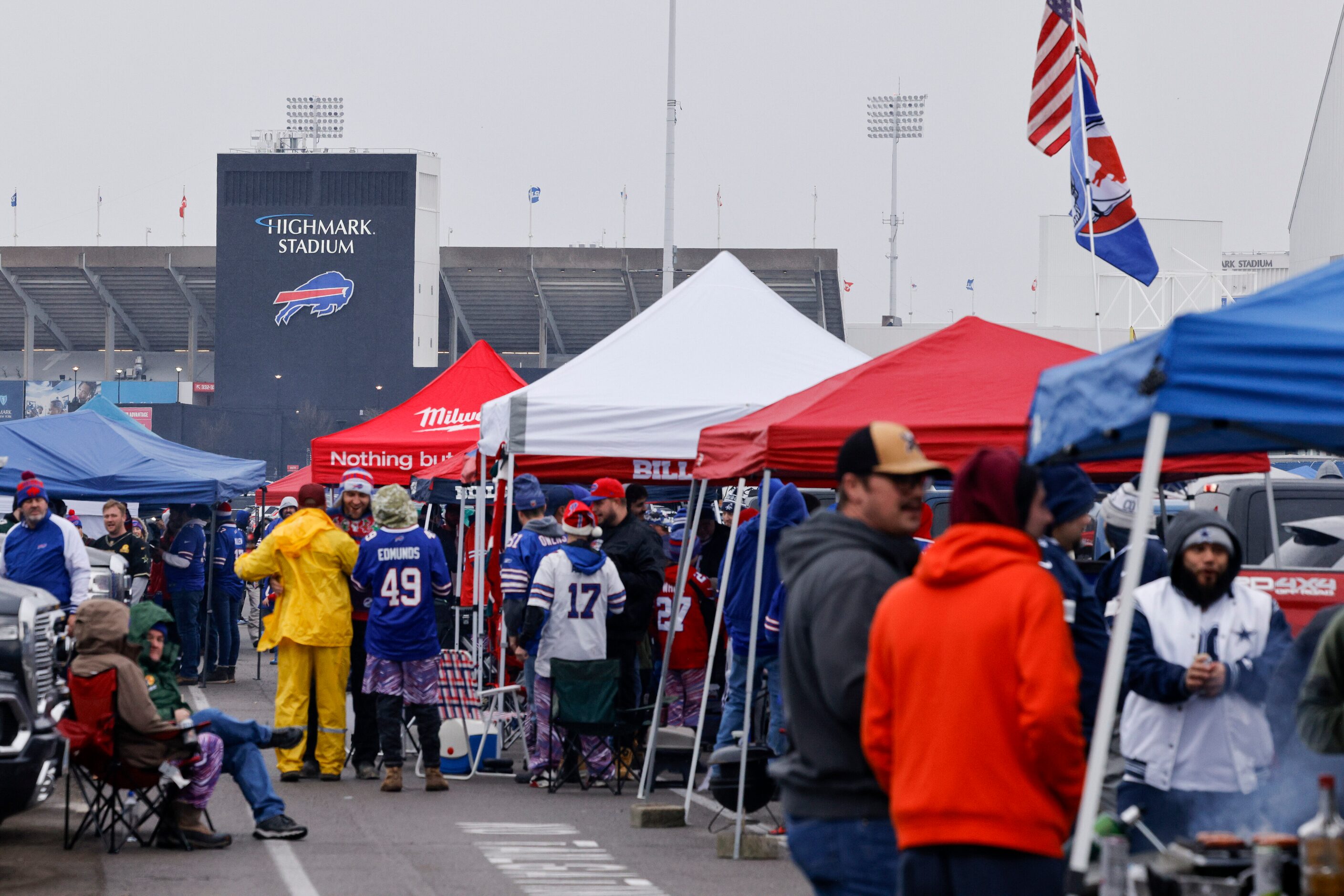 Buffalo Bills and Dallas Cowboys fans tailgate outside Highmark Stadium before an NFL game,...