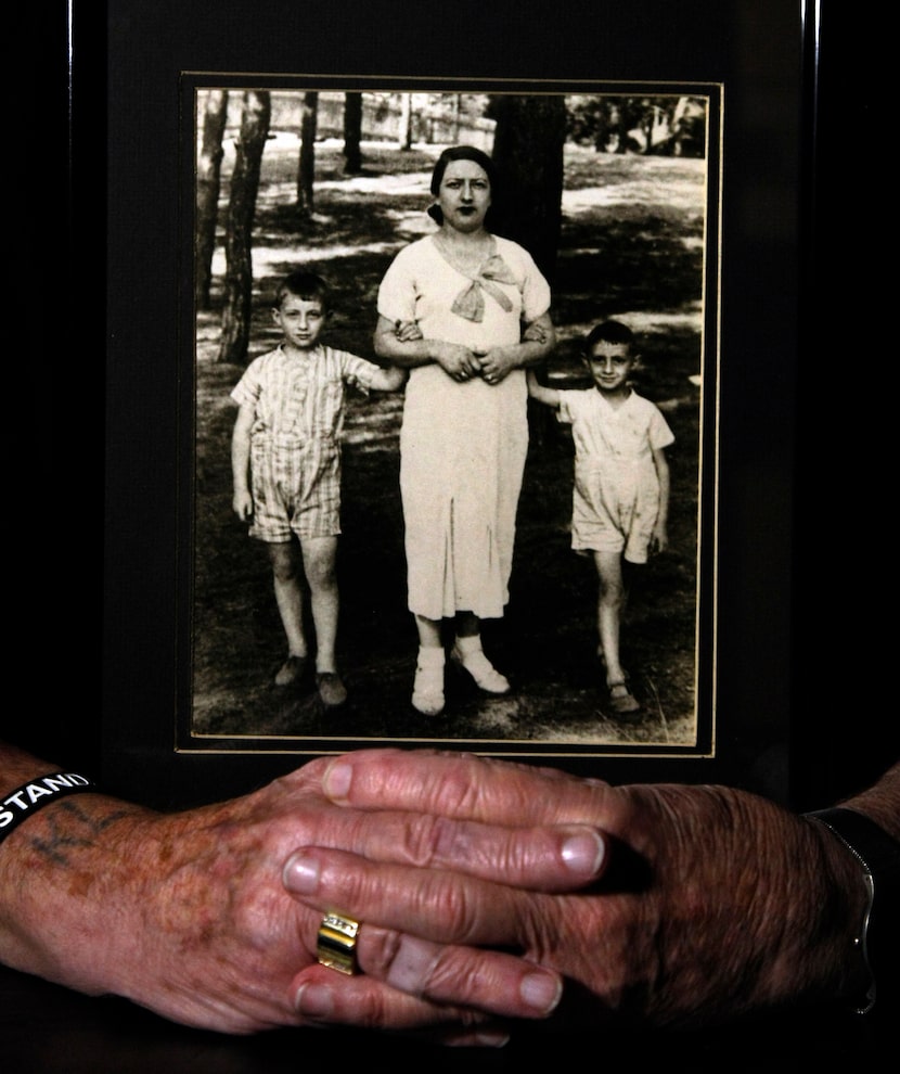 Max Glauben, a longtime Dallas resident who is a Holocaust survivor, wears his Upstander...