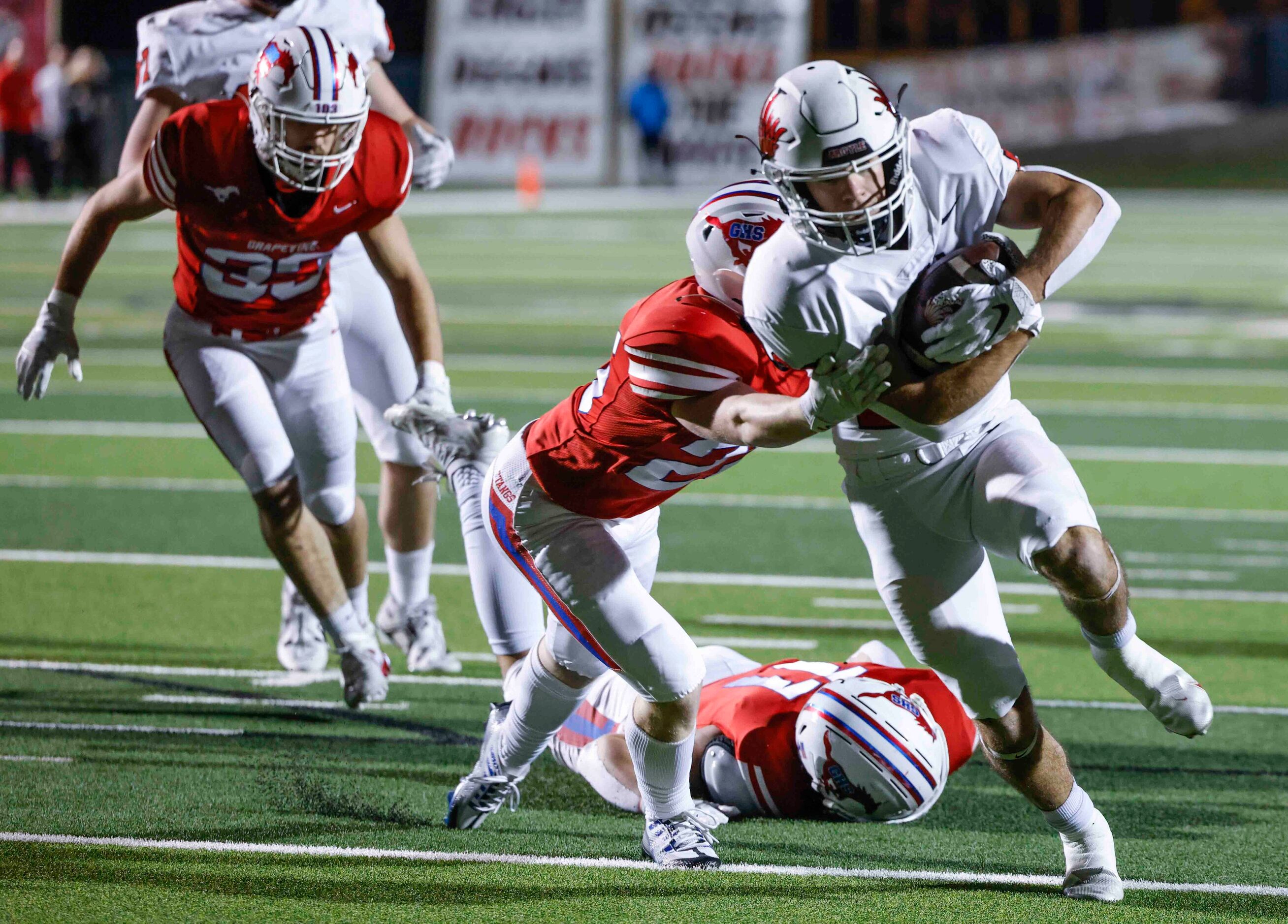 Argyle High’s Landon Farris (20) completes a touchdown during the first half of a football...