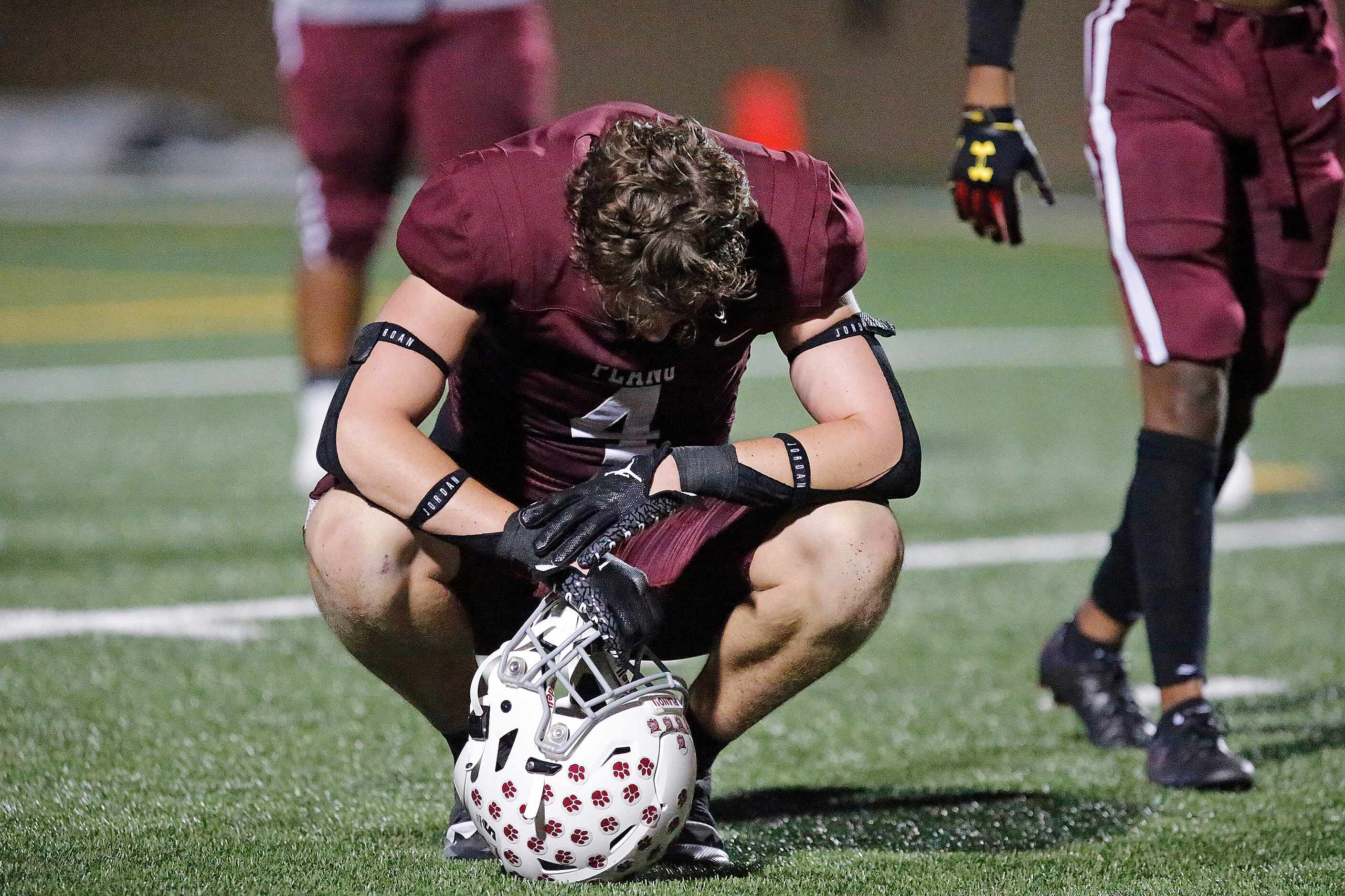 Plano Senior High School free safety Kennon James (4) reacts to losing the game on the last...