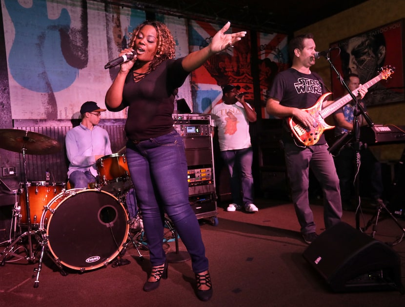 The band Time Machine backs up karaoke singers at Sherlock's Baker St. Pub in Addison. 