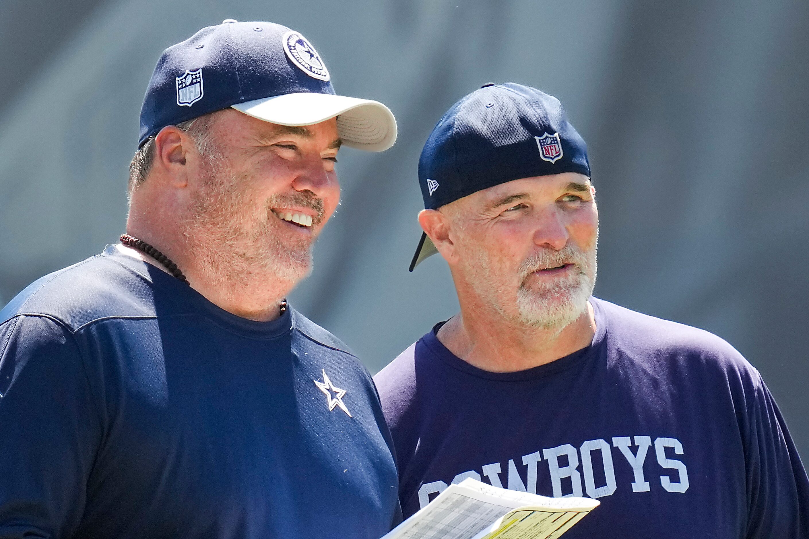 Dallas Cowboys head coach Mike McCarthy (left) and defensive coordinator Dan Quinn watch...