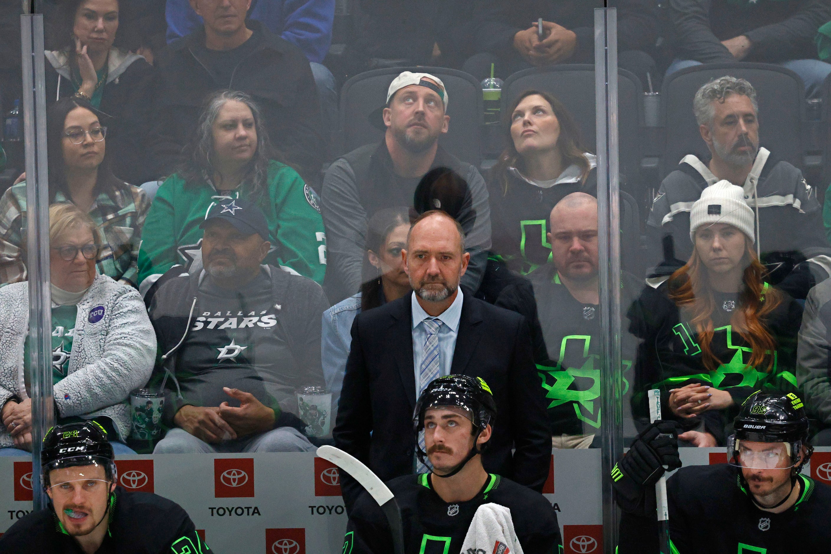 Dallas Stars head coach Pete DeBoer watches his players during the third period of an NHL...