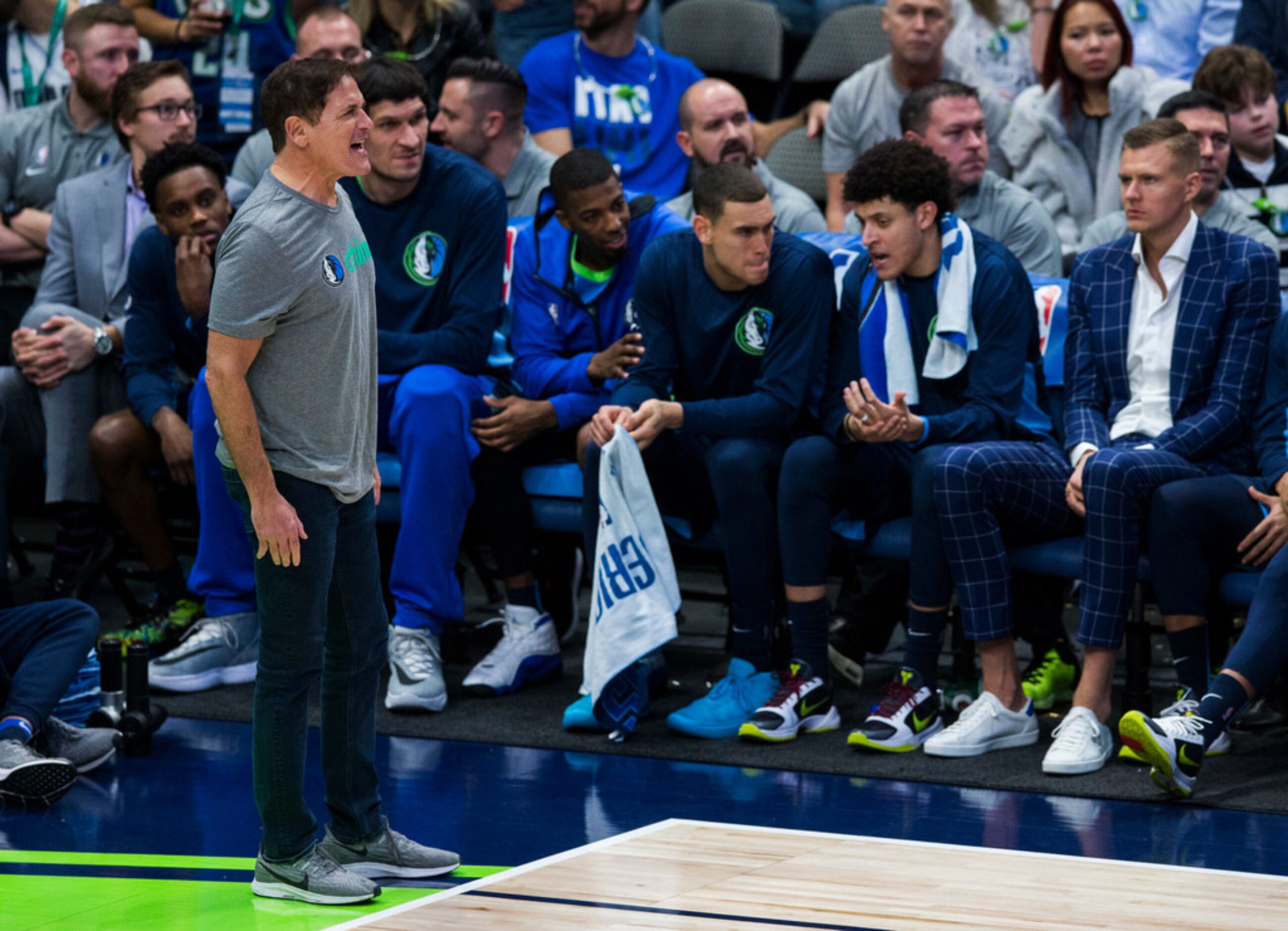 Dallas Mavericks owner Mark Cuban yells at a referee during the fourth quarter of an NBA...