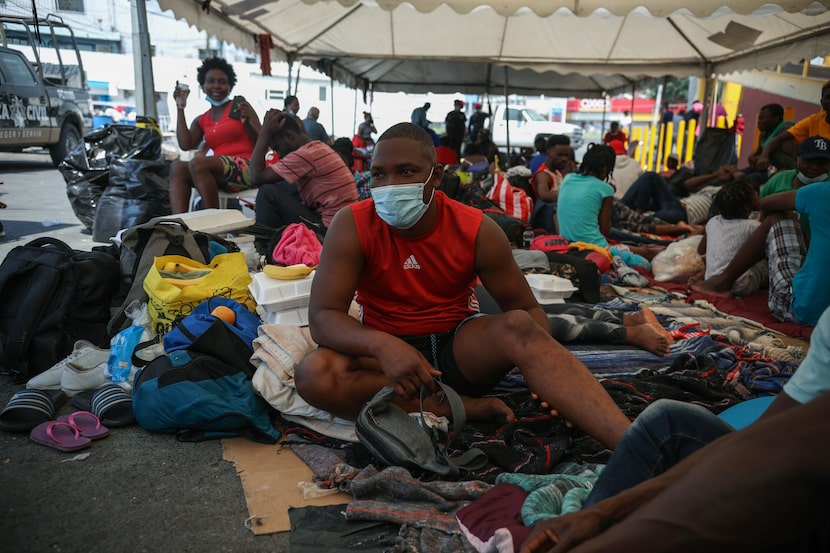 John Brevil, 29, sits outside Casa INDI that serves as a dining room and shelter for...