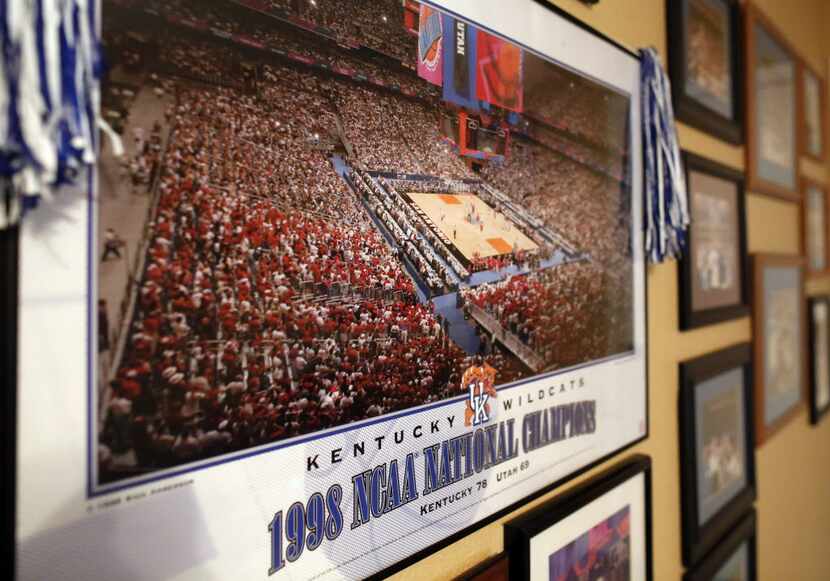 Photo form the 1998 Final Four in San Antonio along with other Kentucky items hang on the...
