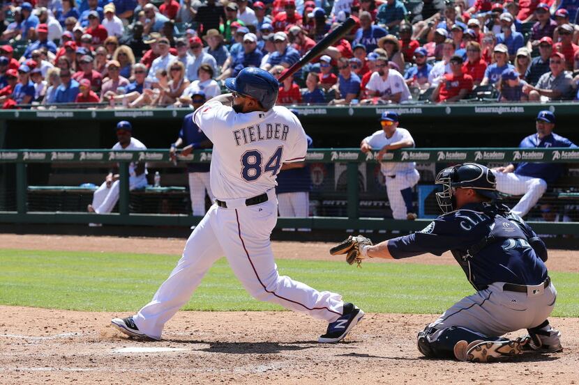 Apr 6, 2016; Arlington, TX, USA; Texas Rangers designated hitter Prince Fielder (84) hits a...