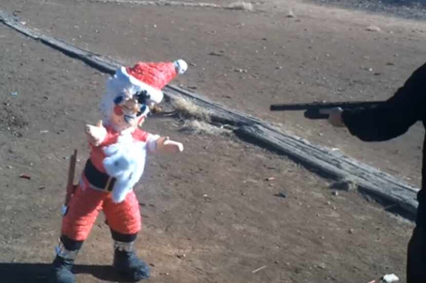 Amarillo pastor David Grisham shooting a replica Santa