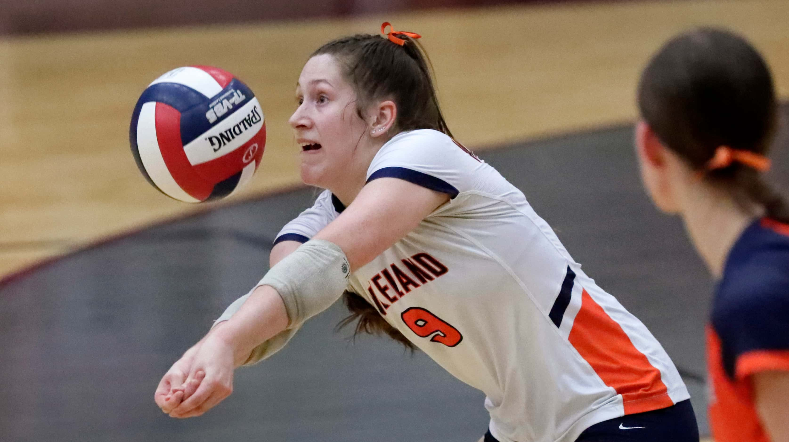 Wakeland High School liber Aubree Fernandez (9) receives serve during game three as Wakeland...