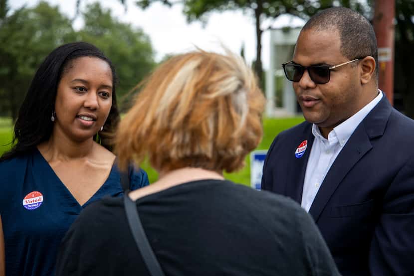 Nakita "Nikki" Johnson and state Rep. Eric Johnson chat with Nancy Hart as she makes her way...