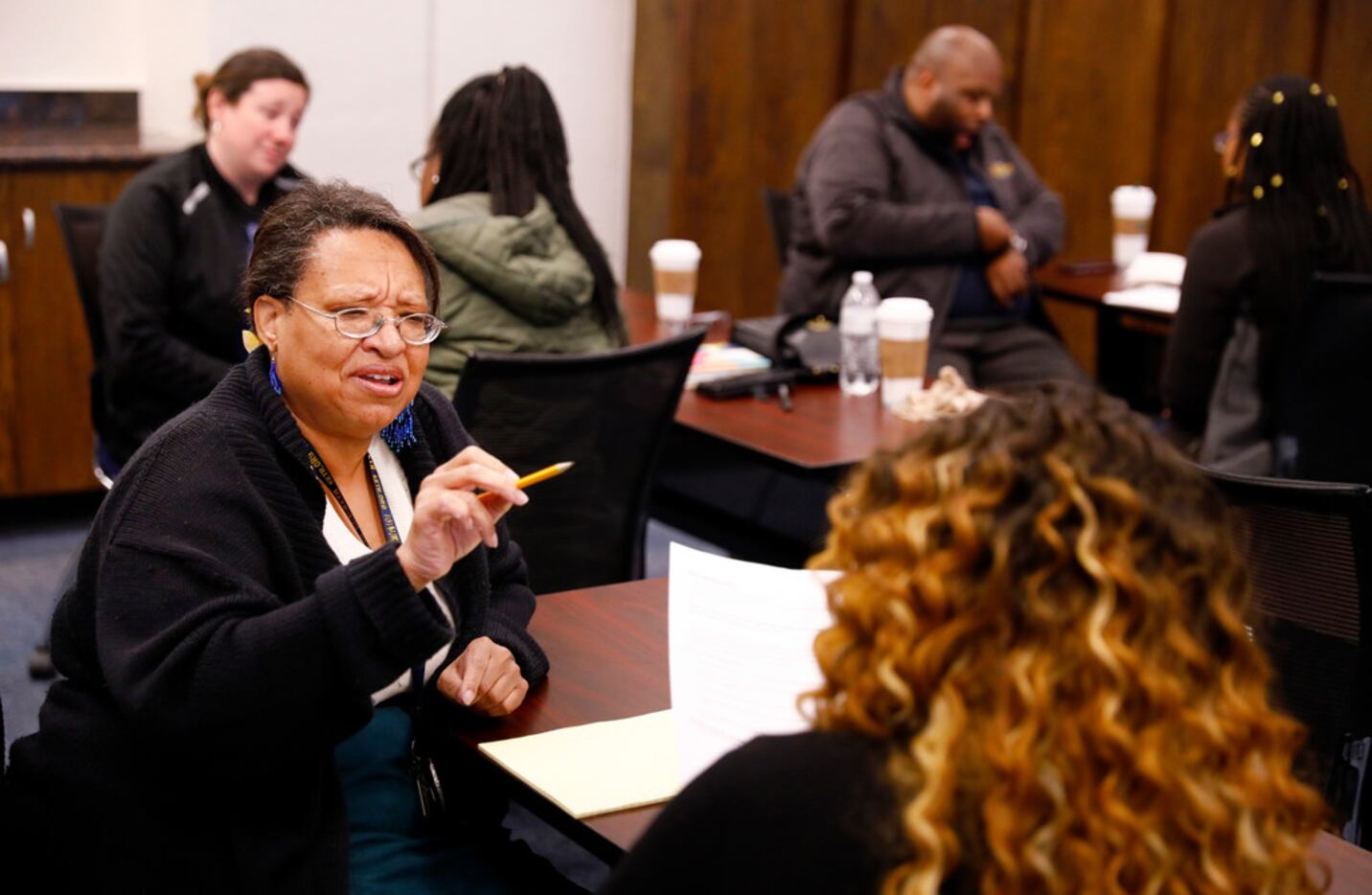 Texas A&M Commerce staff members Terryl Bratek (left) role play a conversation with...