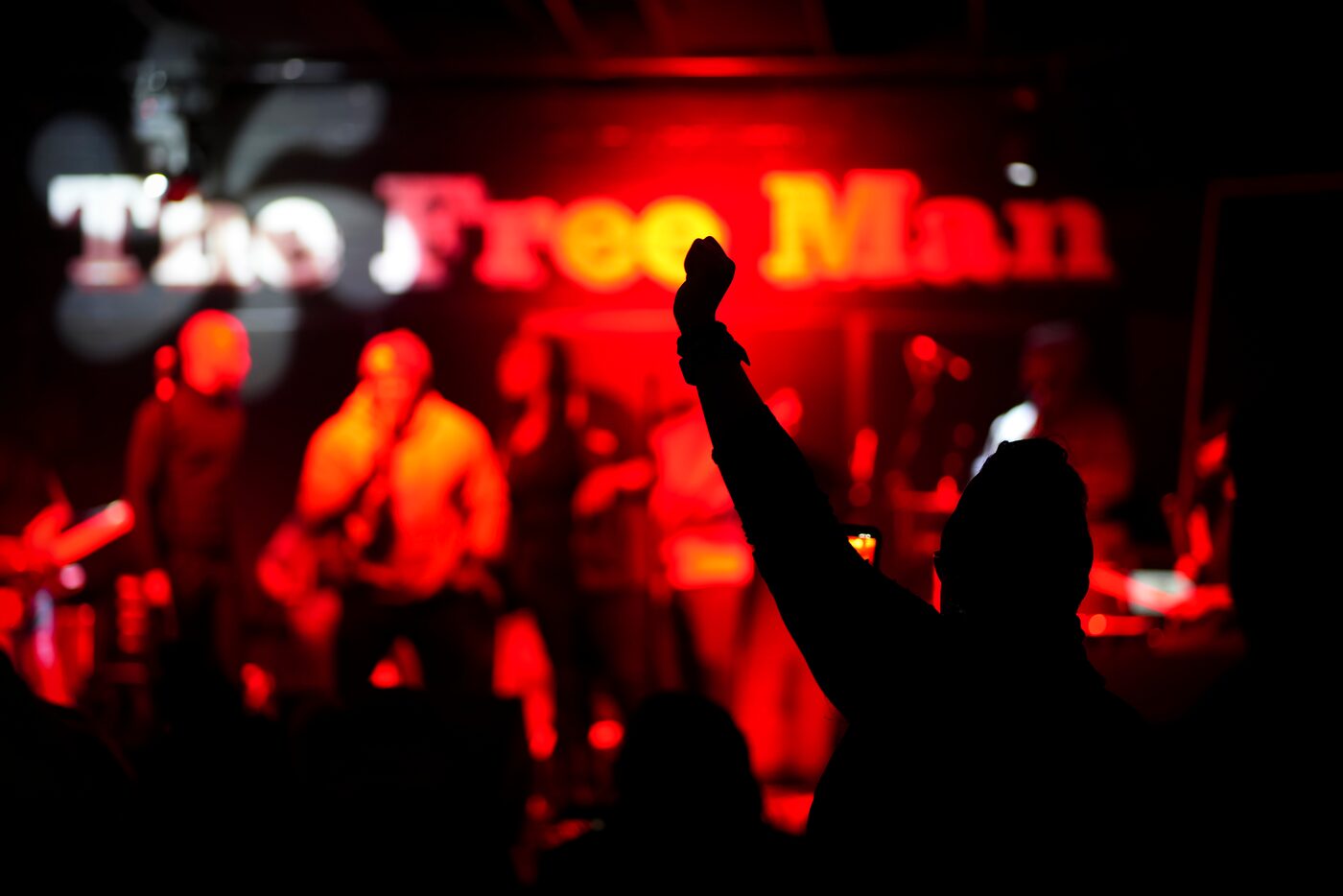 The crowd cheers Gino LockJohnson Iglehart, the general manager of the bar, as he performs...