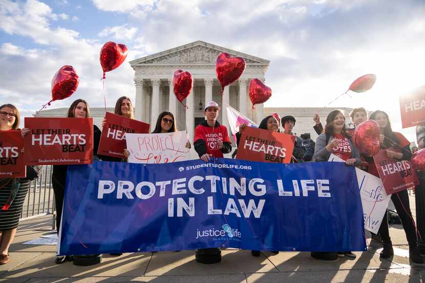Anti-abortion demonstrators rally outside the U.S. Supreme Court on Nov. 1, 2021. On Monday,...