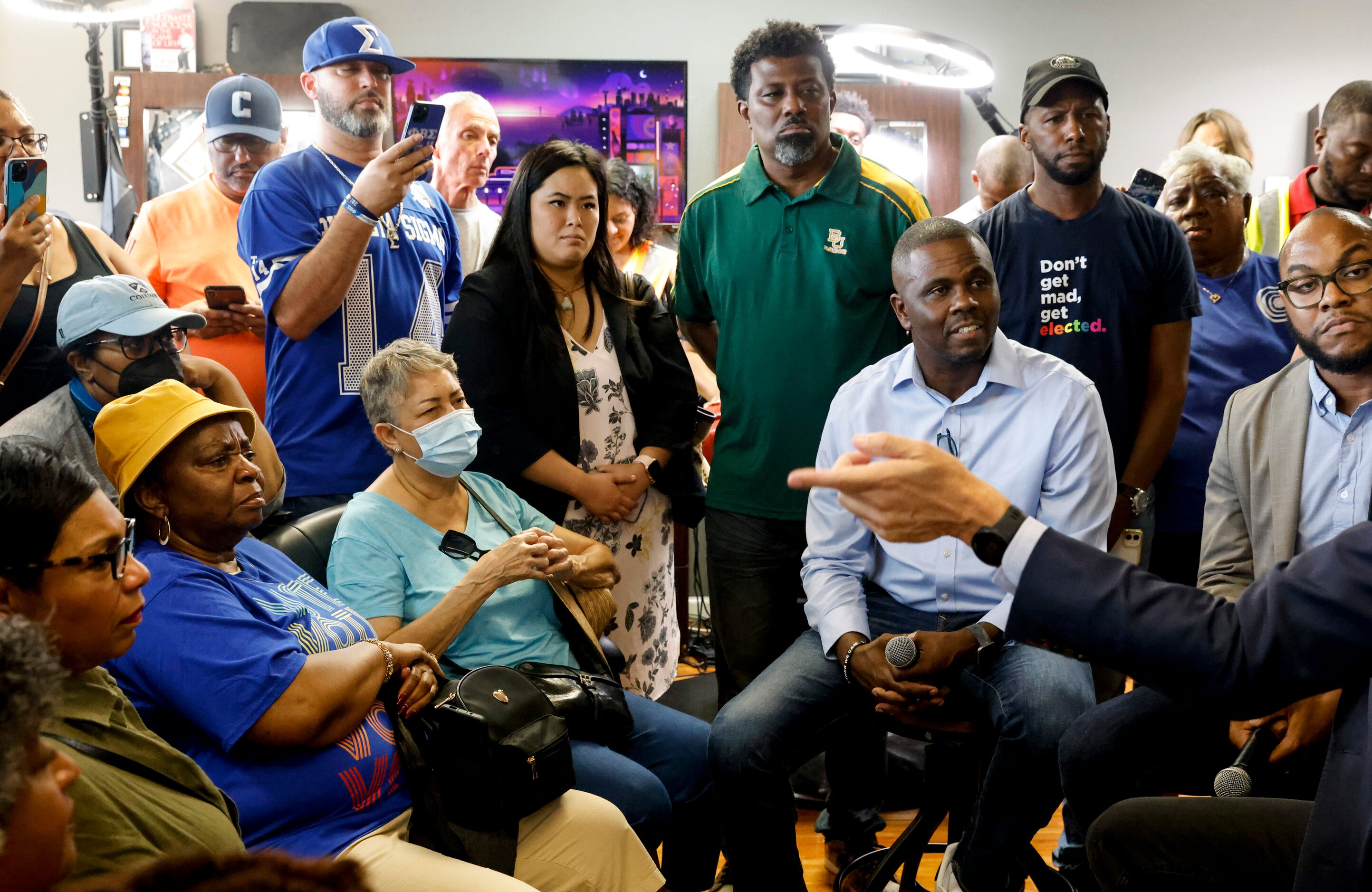 Supporters surrounds Texas Governor candidate Beto O'Rourke as he speaks at Kutinfed...