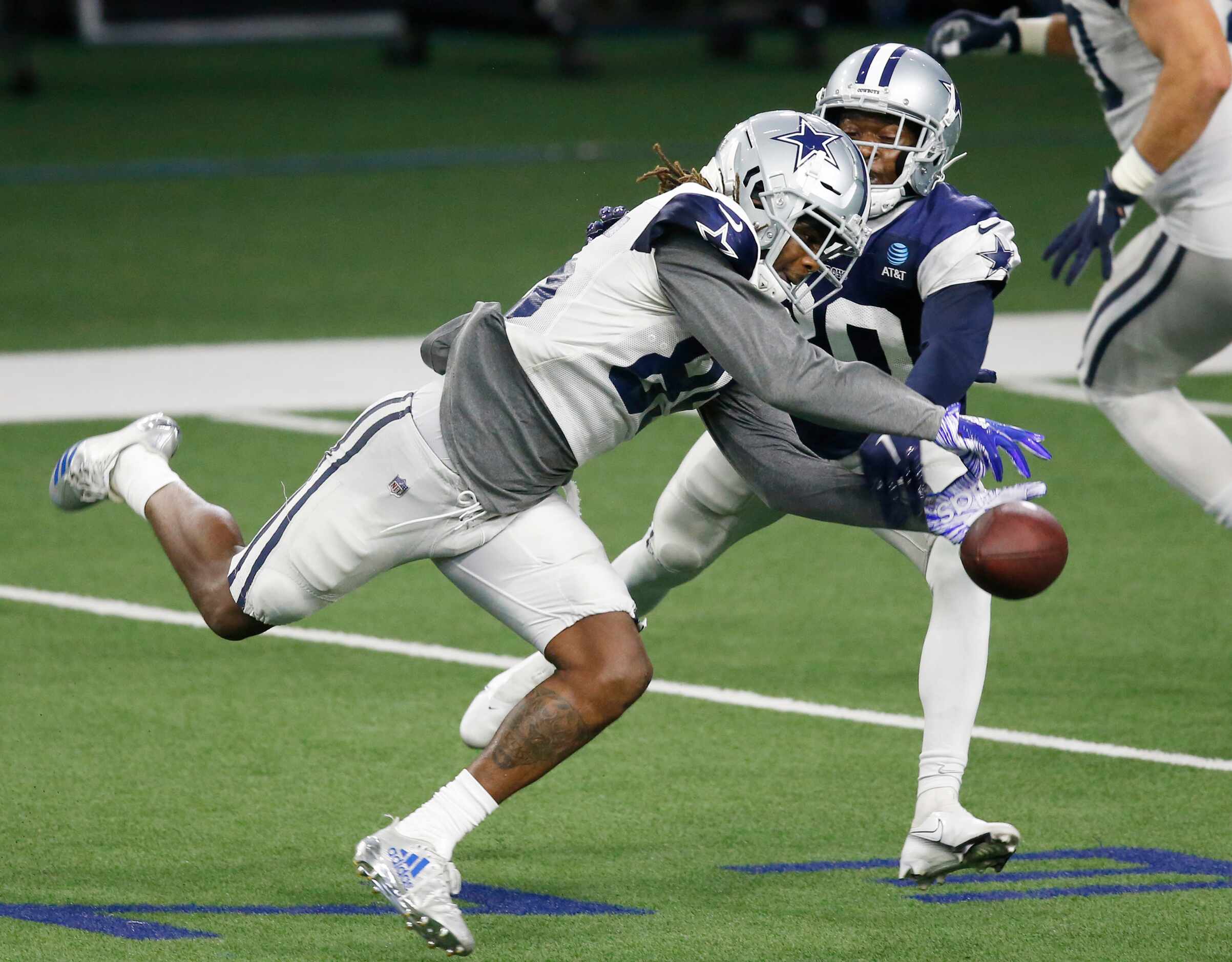 Dallas Cowboys cornerback Anthony Brown (30) breaks up a pass intended for Dallas Cowboys...