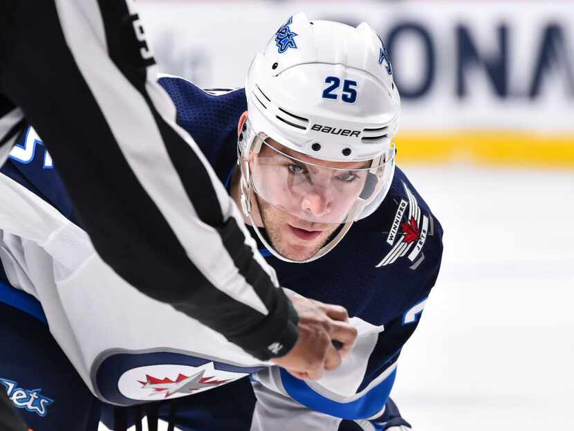 MONTREAL, QC - APRIL 03: Paul Stastny #25 of the Winnipeg Jets is focused on the puck prior...