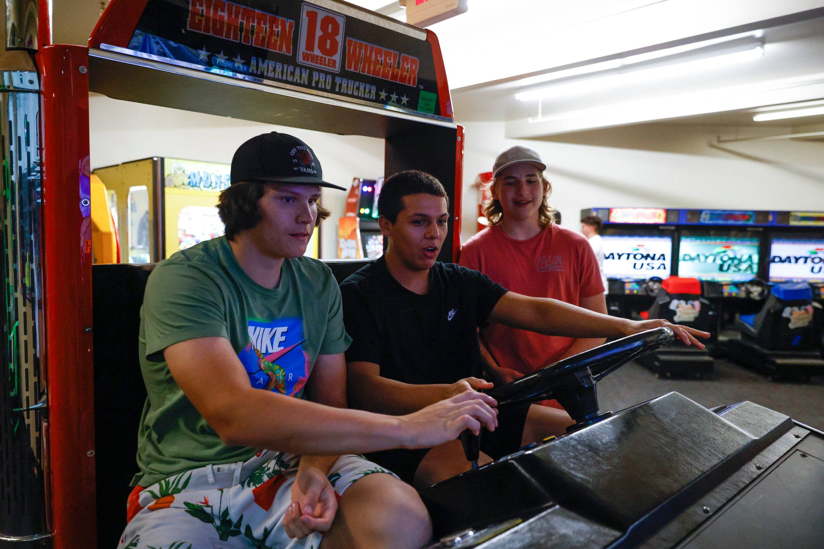 L.D. Bell High School football players Lukas Morris (left)  Lorenzo Martinez (center), and...