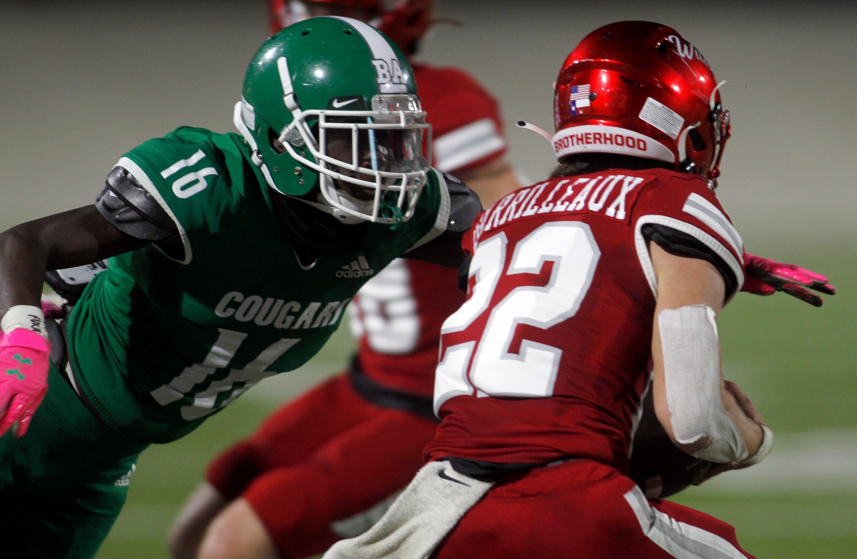 Dallas Bryan Adams defensive back Kirby Lewis (16) tackles Dallas Woodrow Wilson running...