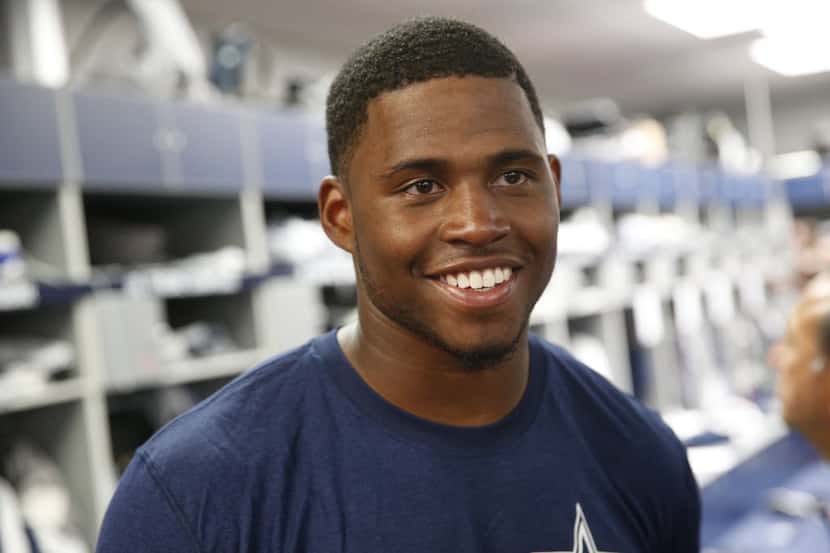 Rod Smith answers question from the media in the Dallas Cowboys locker room at Valley Ranch...