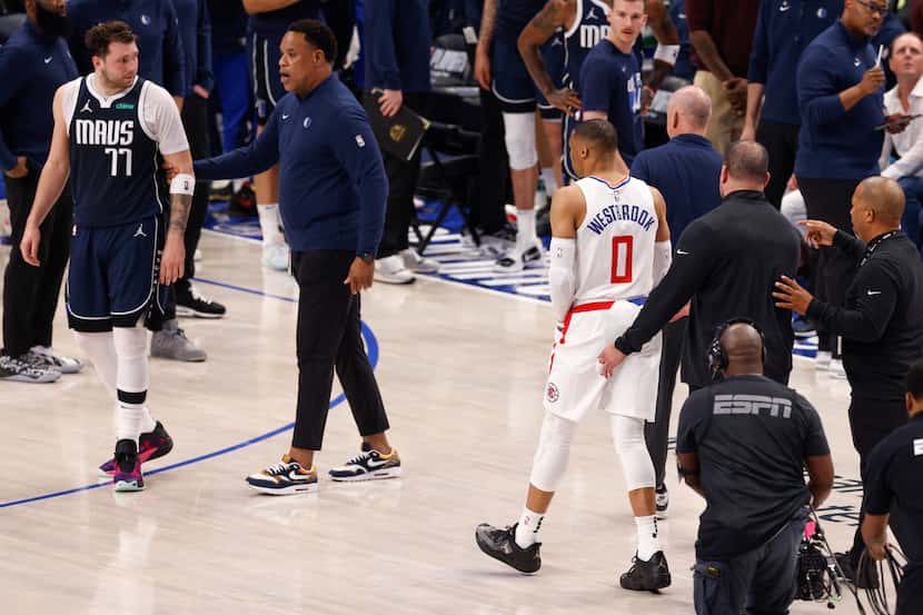 LA Clippers guard Russell Westbrook (0) is escorted off the court after being ejected from...