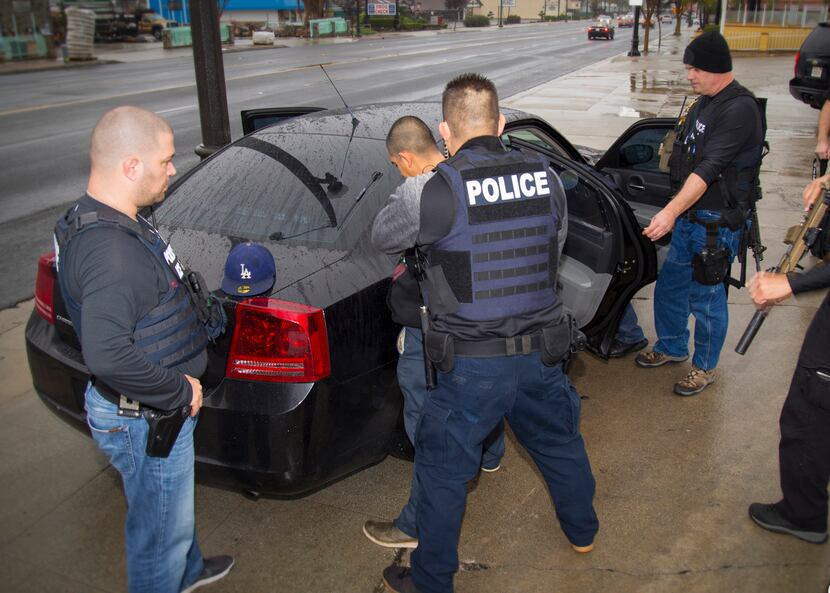 A photo taken by U.S. Immigration and Customs Enforcement shows a man being arrested this...