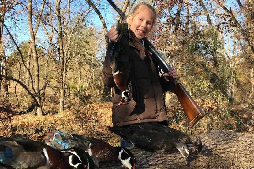Alexia Peterson, 11, bagged two wood ducks with one shot on her first duck hunt. Her father,...