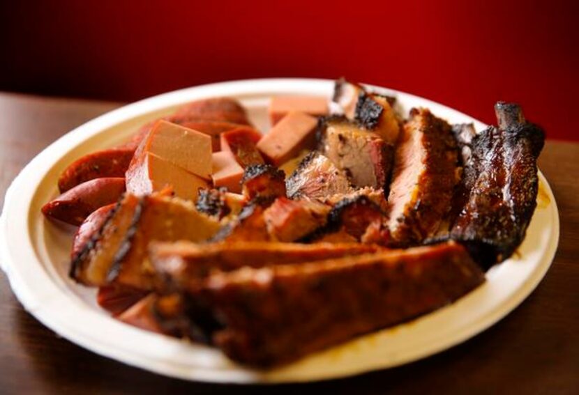 
Plates full of smoked brisket, ribs sausage and even bologna at Lazy S&M BBQ 
