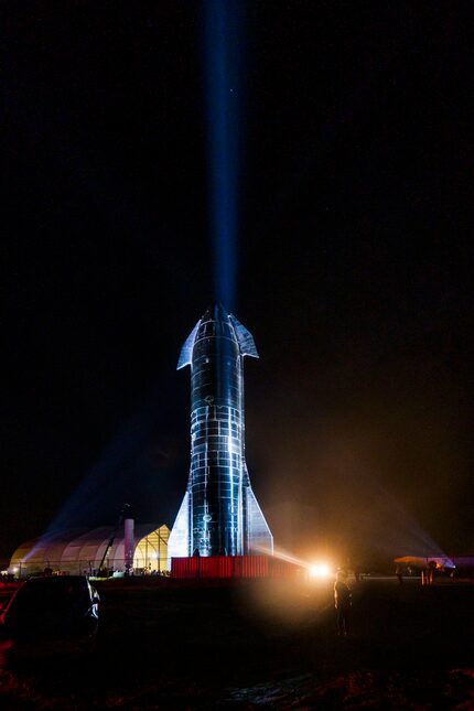 Spotlights illuminate a prototype of the SpaceX Starship spacecraft at the SpaceX Space...