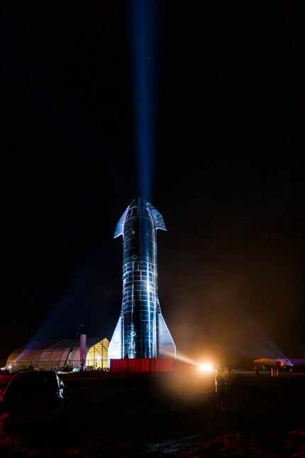 Spotlights illuminate a prototype of the SpaceX Starship spacecraft at the SpaceX Space...