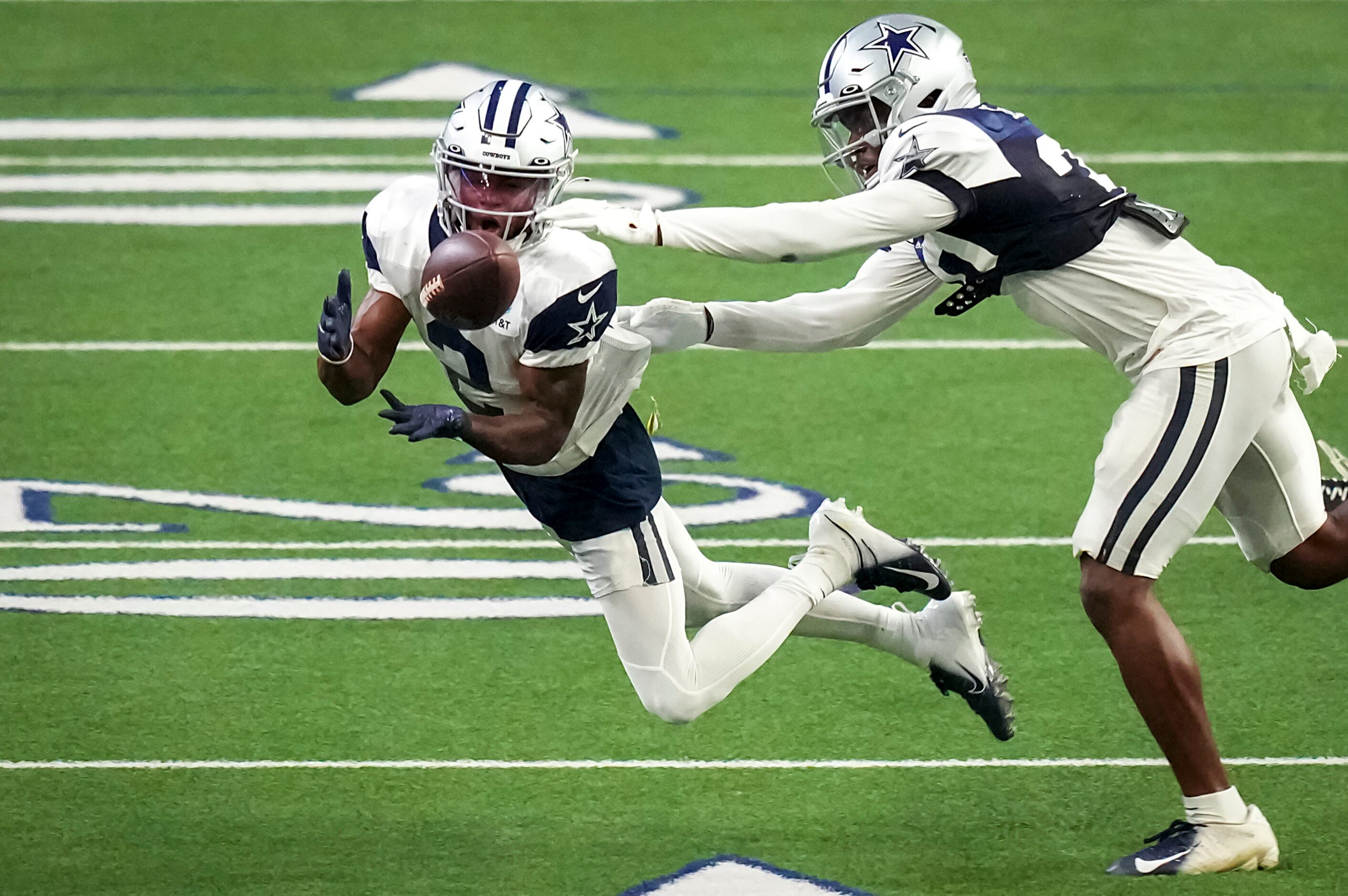 Dallas Cowboys wide receiver KaVontae Turpin (2) makes a catch as cornerback DaRon Bland...