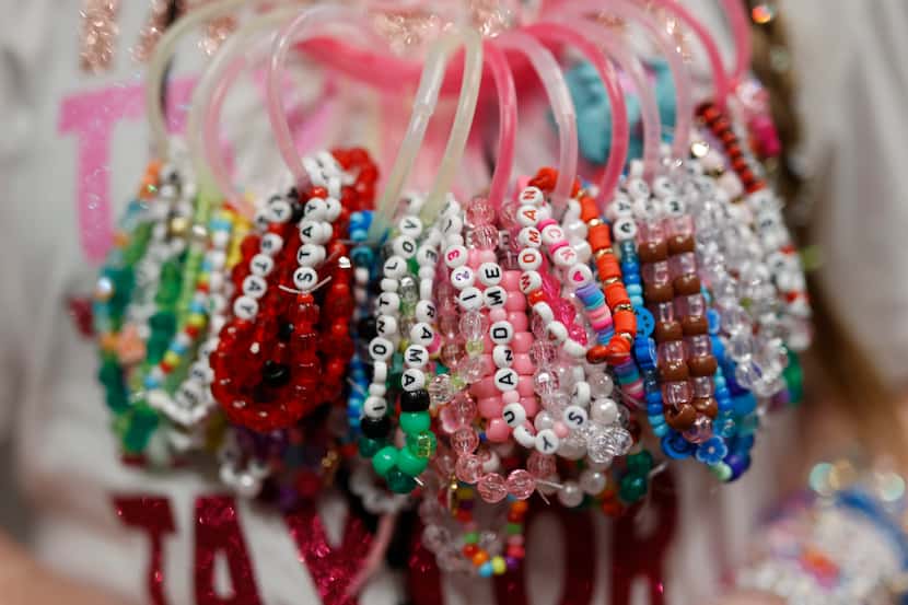 The many friendship bracelets of Reece Davis, 12, who attended the Swiftie-themed...