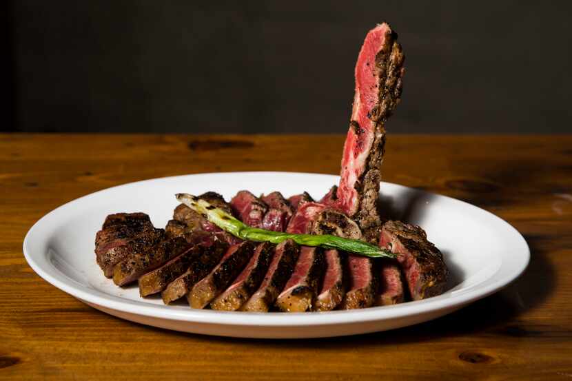 Town Hearth is known for its swanky interior and steak menu. Here's the 24-ounce Porterhouse...