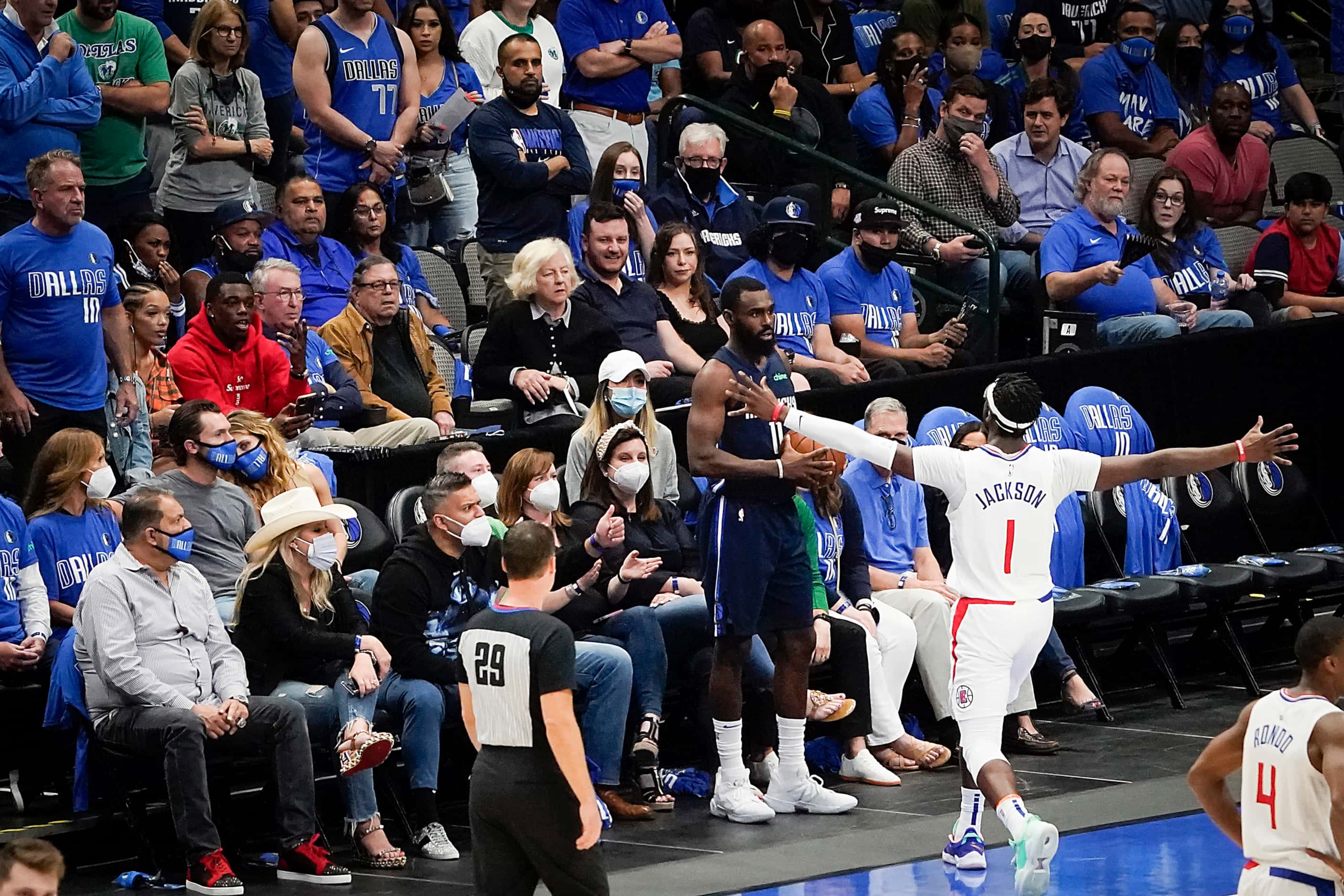 LA Clippers guard Reggie Jackson (1) tries to distract Dallas Mavericks guard Tyrell Terry...