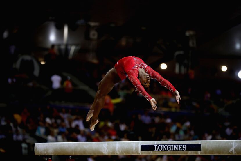 Simone Biles competes on the balance beam during the 2018 FIG Artistic Gymnastics...