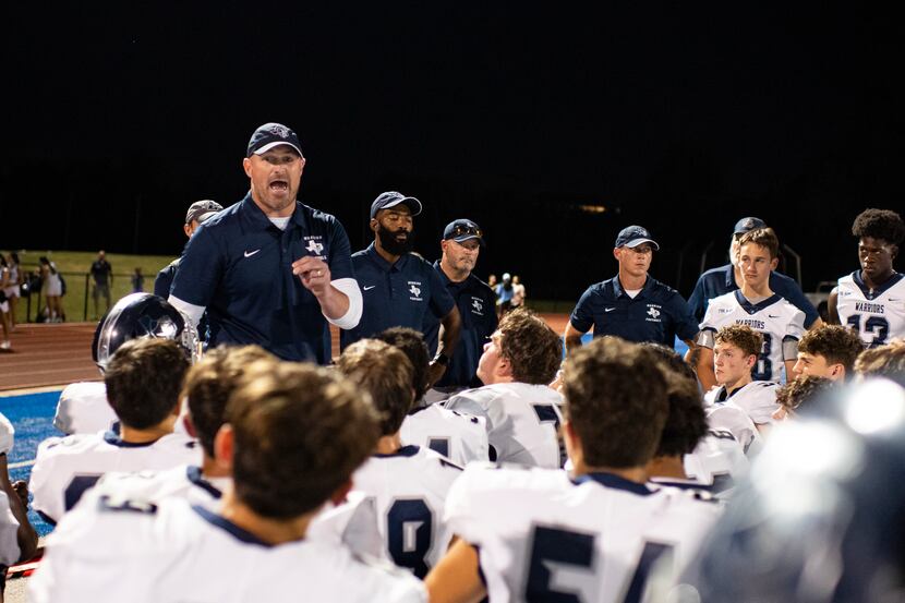 Argyle Liberty Christian Head Coach Jason Witten talks to his players at the conclusion of...