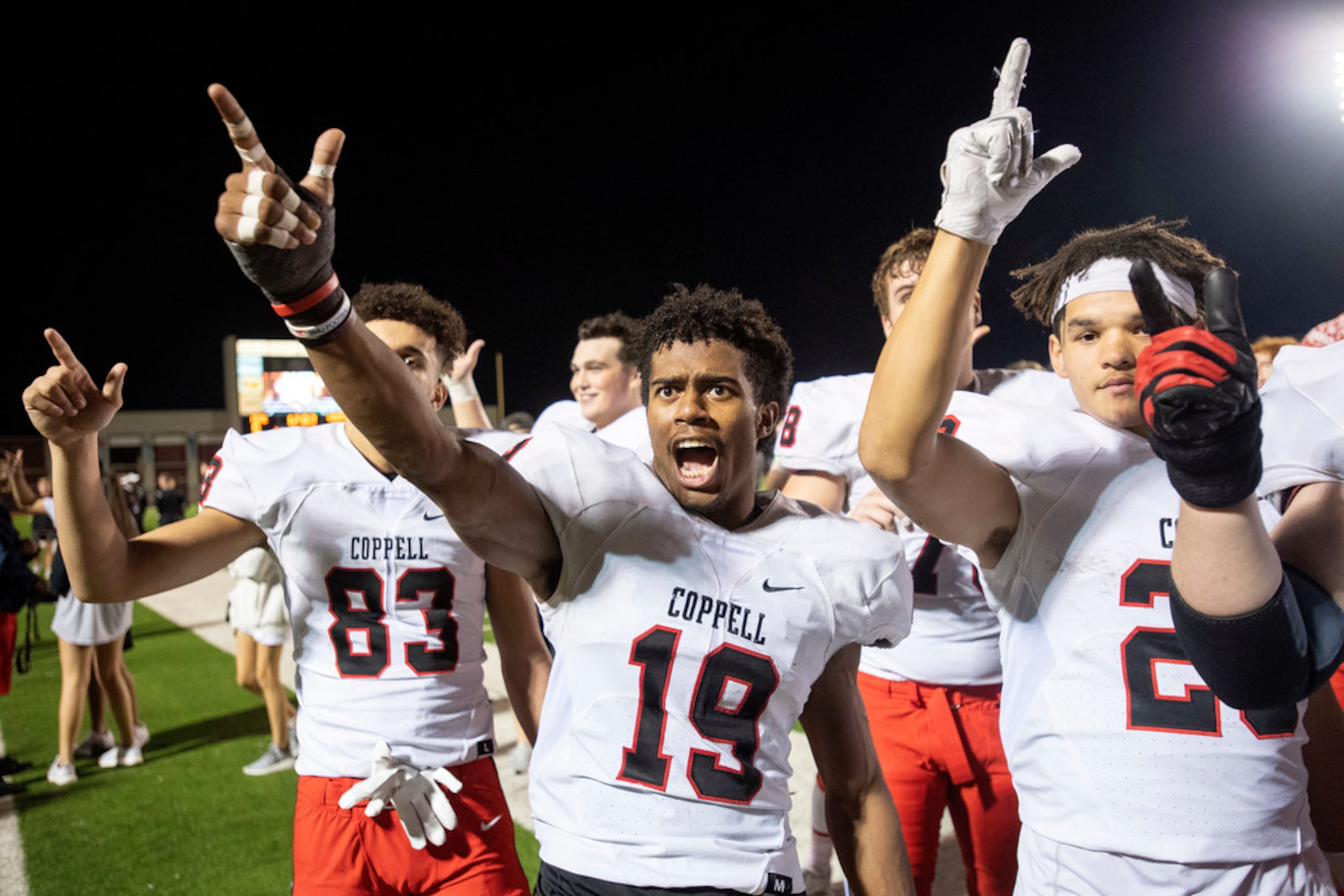 Coppell senior linebacker Xavier Brown (19) and junior defensive back Jackson Matthews (25)...