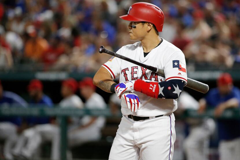 Texas Rangers' Shin-Soo Choo (17) preapres to batt during a baseball game against the...