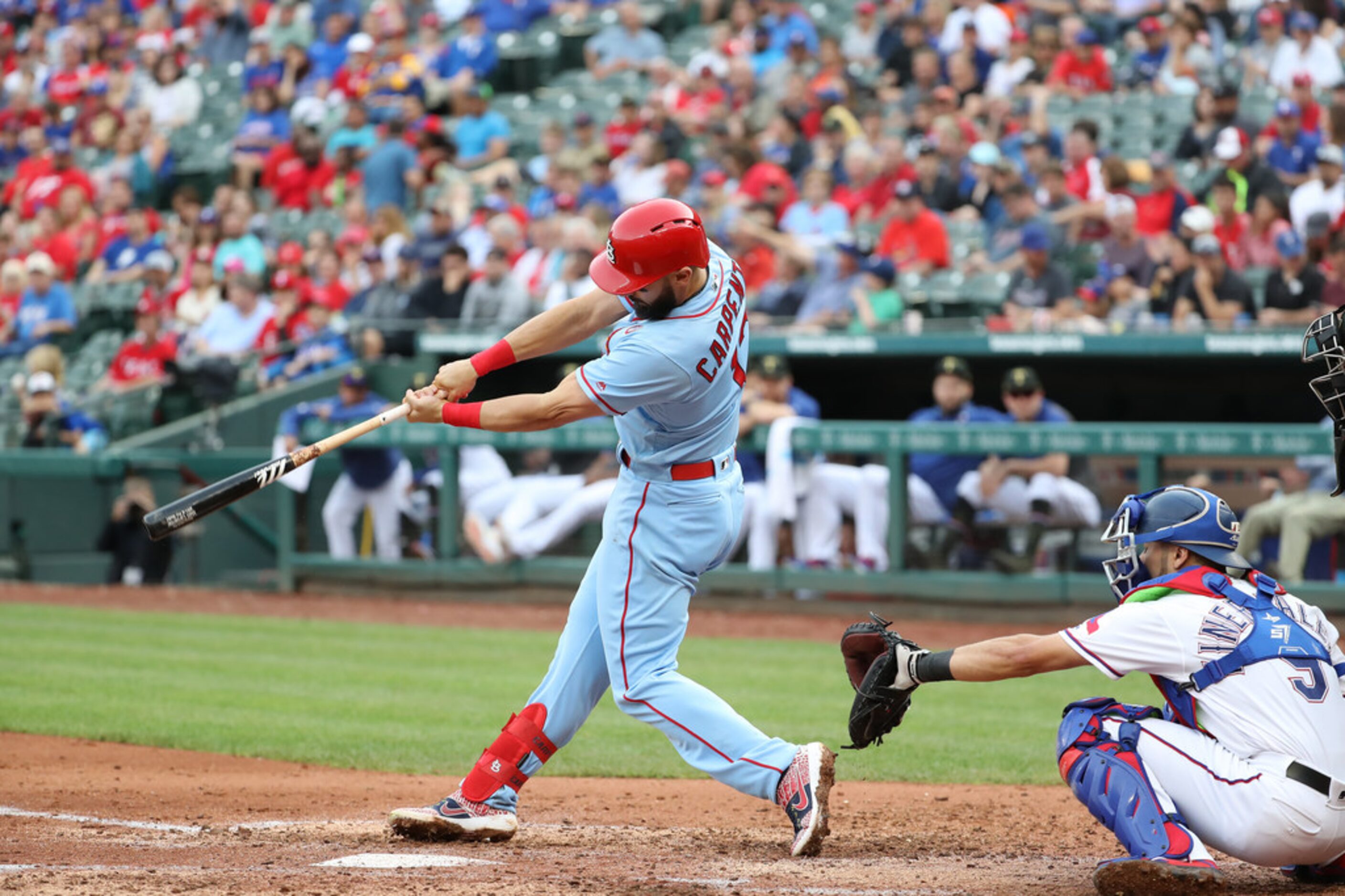 ARLINGTON, TEXAS - MAY 18:  Matt Carpenter #13 of the St. Louis Cardinals hits a rbi double...