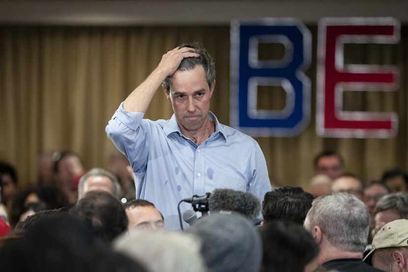 2020 Democratic presidential hopeful Beto O'Rourke listens to a question during a town hall...