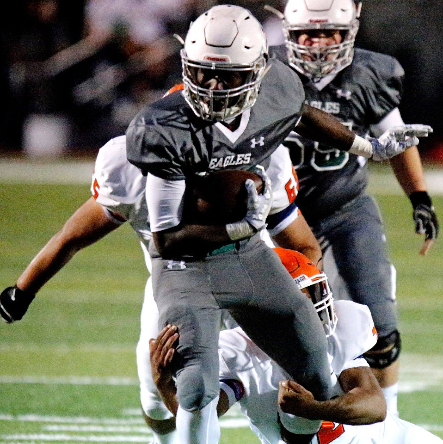 Prosper High School running back Wayne Anderson (23) carries the football during the first...