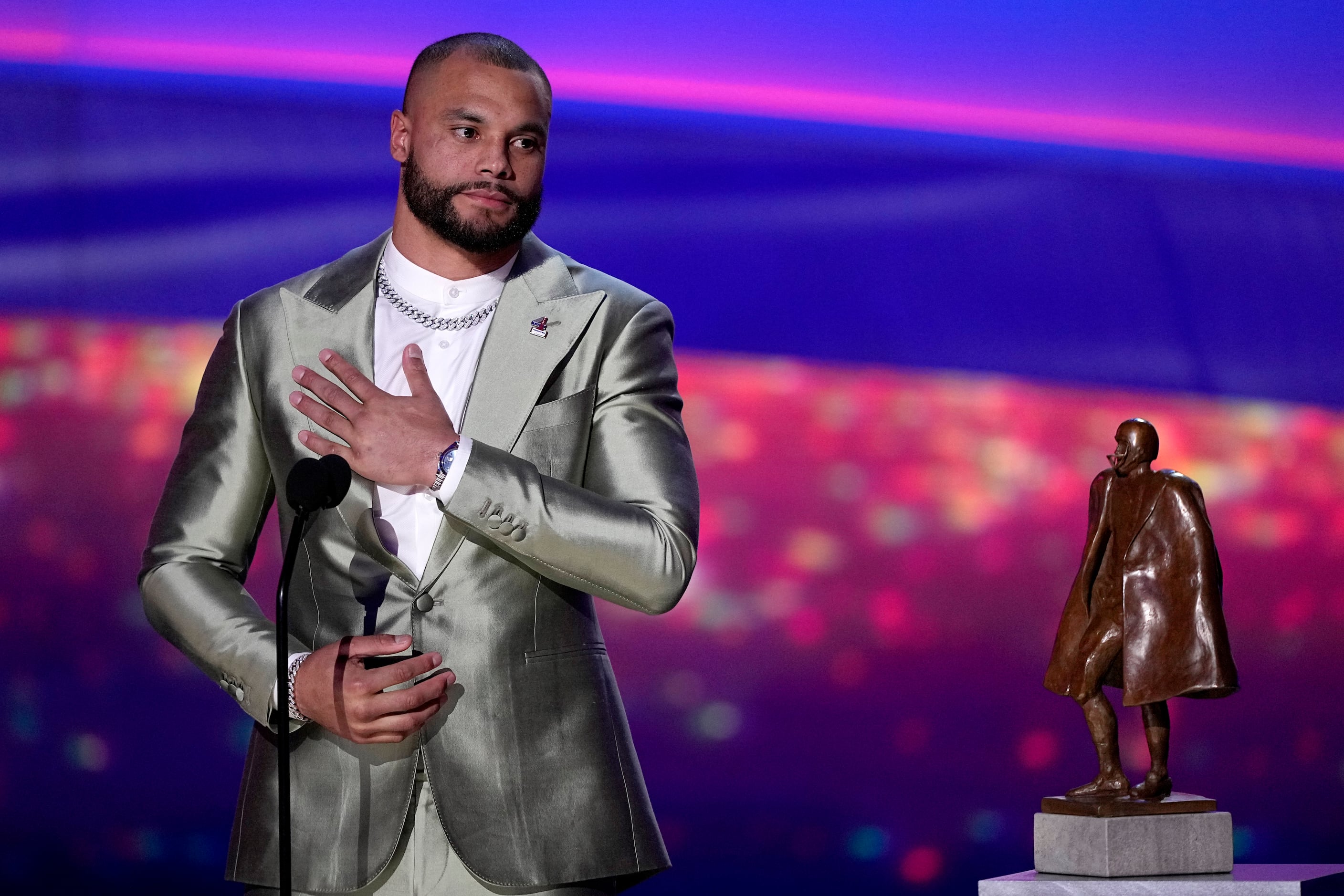 A decal for the Walter Payton NFL Man of the Year Award is seen on the  helmet of Dallas Cowboys quarterback Dak Prescott during the first half of  an NFL football game