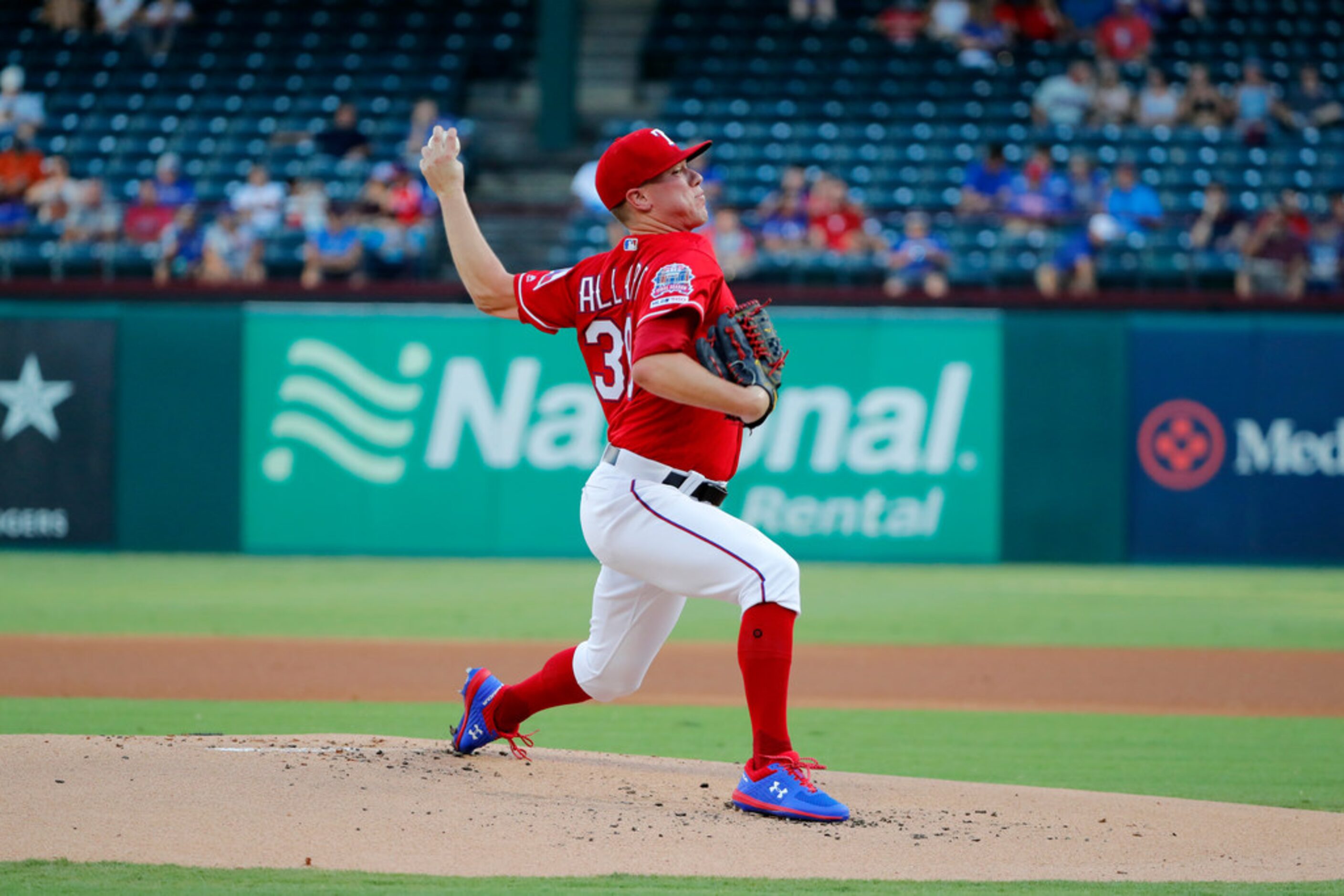 Texas Rangers relief pitcher Kolby Allard (39) throws to the Los Angeles Angels in the first...