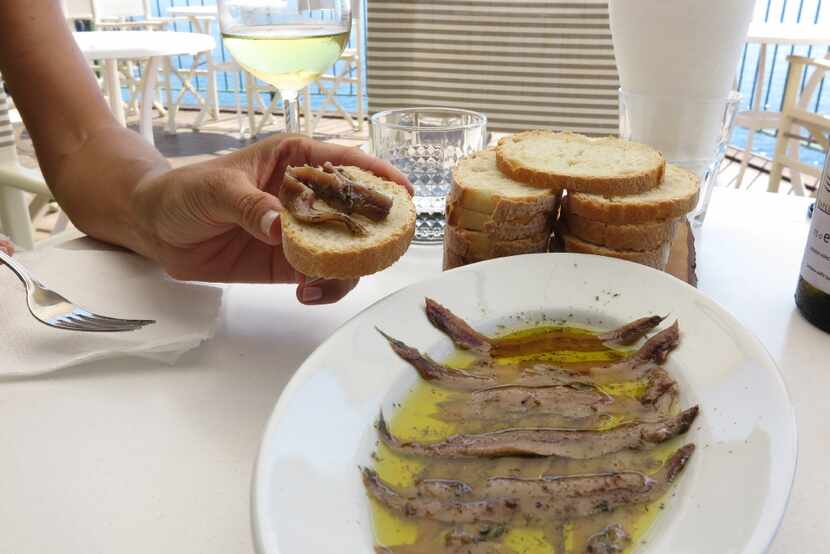 At Vernazza Experience in Vernazza, Italy, try salted anchovies in olive oil paired with a...